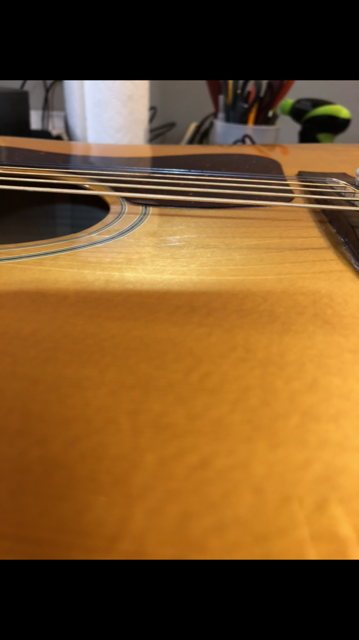 D30 cracked soundhole-sideview.PNG
